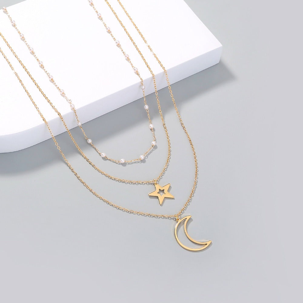 Zarte mehrreihige Halskette mit Stern und Mond